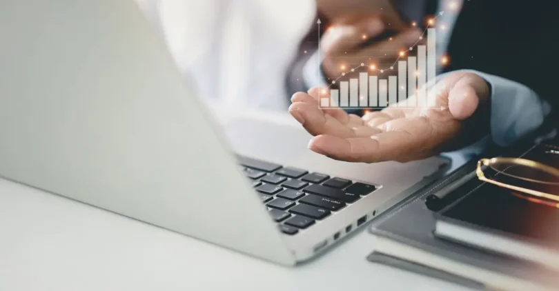 business-man-black-suit-sitting-working-computer-mobile-phone-man-hands-showing-business-growth-success-result-virtual-chart-diagram-with-future-growing-plan business-man-black-suit-sitting-working-computer-mobile-phone-man-hands-showing-business-growth-success-result-virtual-chart-diagram-with-future-growing-plan