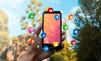 hand-holding-smartphone-social-media-concept